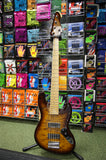 Revelation RBN 5 string bass guitar in quilted maple dark sunburst