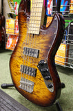 Revelation RBN 5 string bass guitar in quilted maple dark sunburst