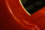 Vintage AV1/HF electric guitar in honeyburst flame finish