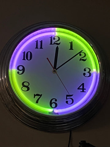 Wall clock with neon colour changing